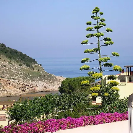 Апартаменты Locazione Turistica Nisporto Mare.3 Каво